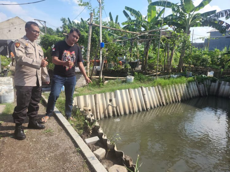 Wujudkan Ketahanan Nasional,Bhabinkamtibmas Tebel Tinjau Lahan Ikan Nila Dukung Swasembada Pangan