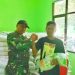 Babinsa Kelurahan Larangan Dampingi Penyaluran Bantuan Beras Untuk Warga